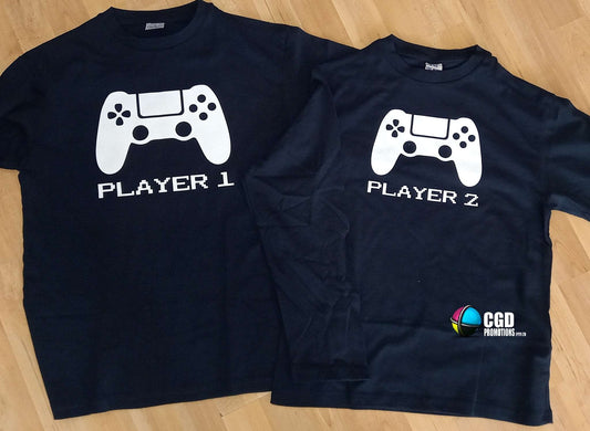 “Father and son wearing Player 1 & Player 2 matching shirts – adult unisex and kids tee set”