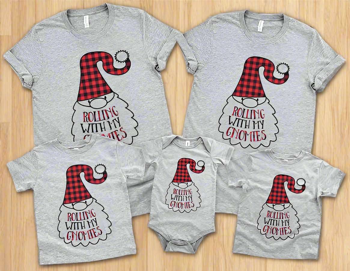 “Family of four wearing 'Rolling with My Gnomies' Christmas matching t-shirts – adult unisex, ladies fitted, and kids tees”