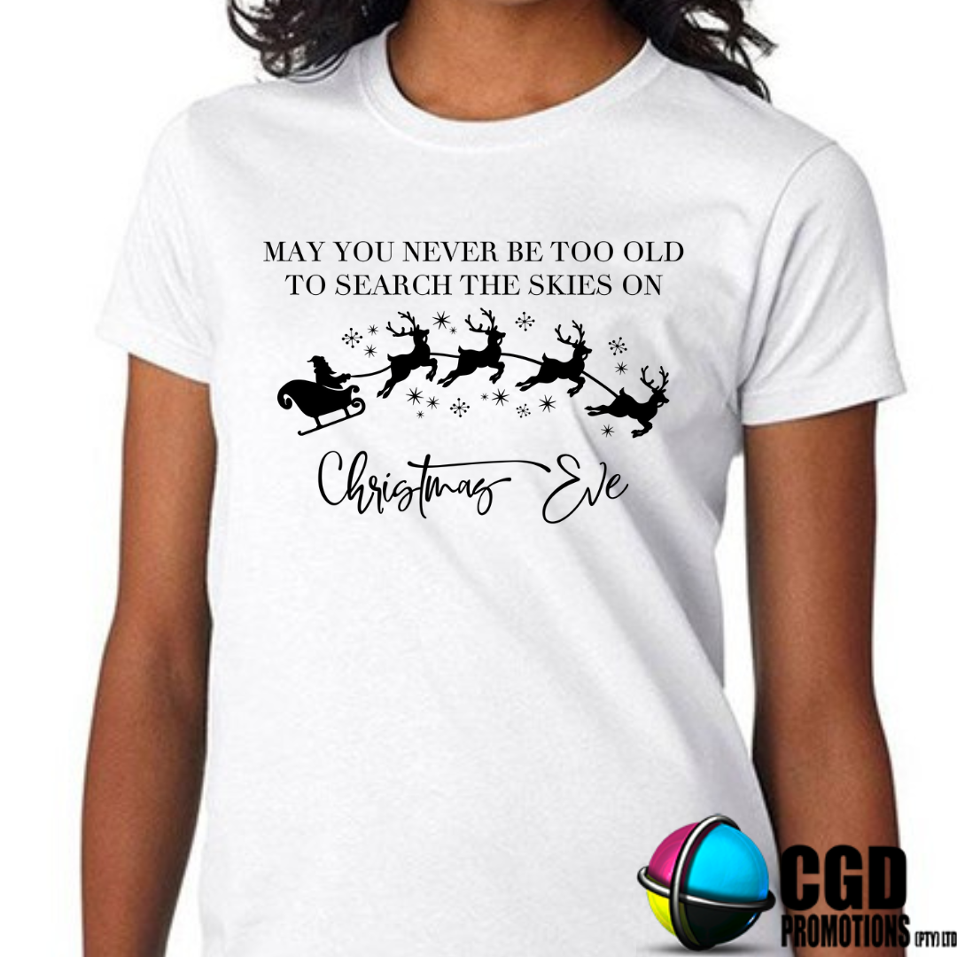 May You Never Be Too Old To Search The Skies On Christmeas Eve with Santa and Reindeers - Christmas Adult Christms Printed Shirt - Unisex Mens & Ladies Fitted
