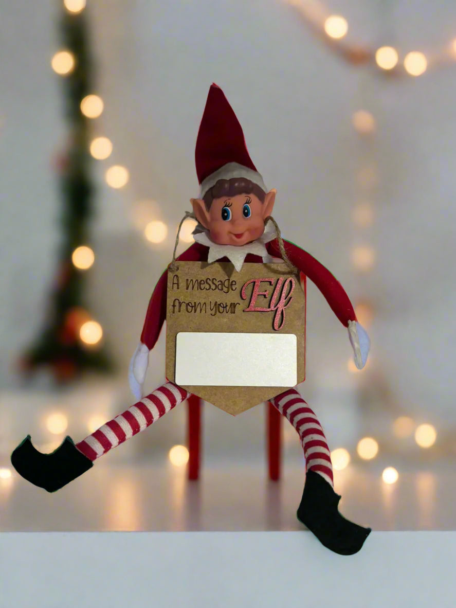 Decorative Elf on the Shelf treehouse prop featured in the activity box display