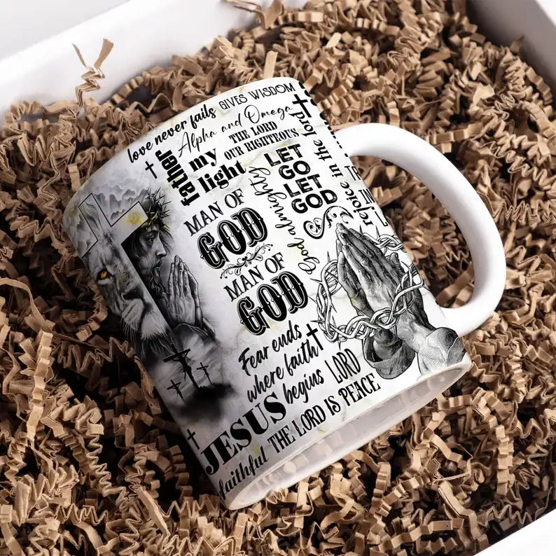 Man of Faith ceramic mug with black and white lion, cross, and Jesus crown design – durable faith-based gift for men