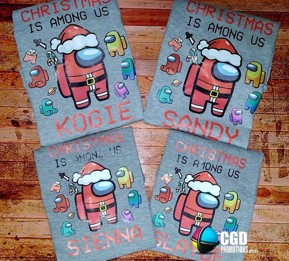 “Family of four wearing Among Us Christmas matching family shirts – adult unisex, ladies fitted, and kids tees”

