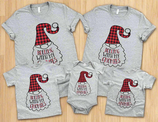 “Family of four wearing 'Rolling with My Gnomies' Christmas matching t-shirts – adult unisex, ladies fitted, and kids tees”

