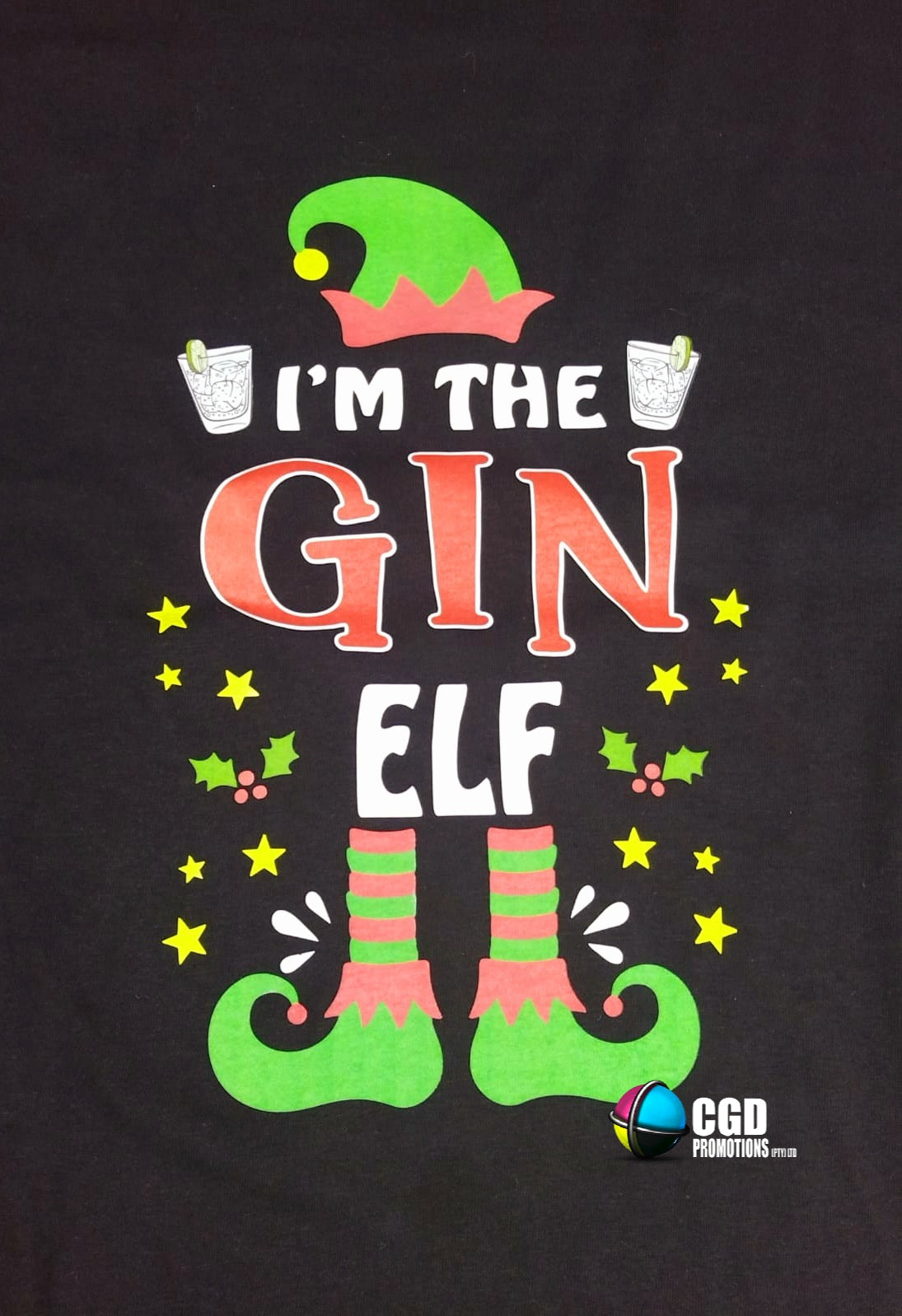 "I'm the Gin Elf Christmas shirt for gin lovers, featuring playful holiday text on a soft fabric. Available in unisex and ladies' fitted styles, perfect for festive gatherings or gift-giving."